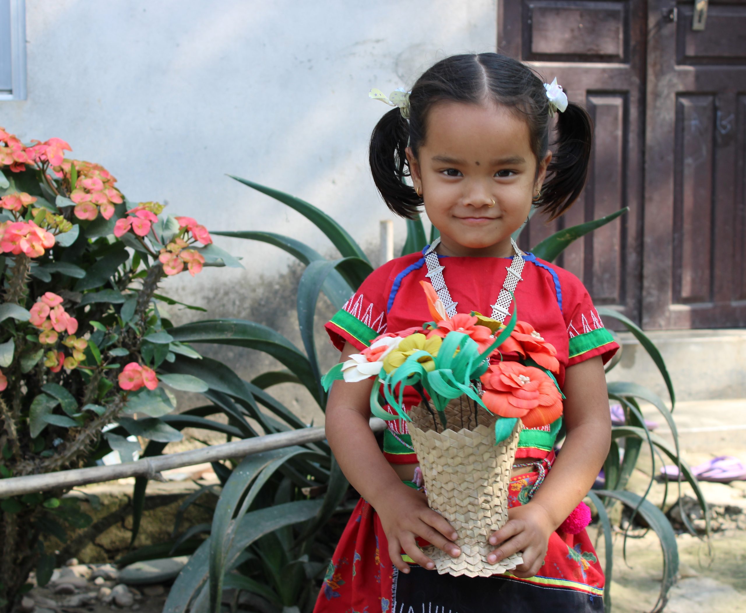 Nilan weaves handicrafts to support her daughter.